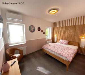 Una cama o camas en una habitación de Ferienhaus Berlin