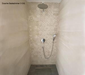 Ett badrum på Ferienhaus Berlin