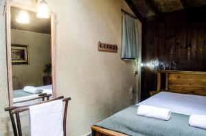 Postel nebo postele na pokoji v ubytování DIMITRA's VILLAS