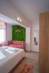 Postel nebo postele na pokoji v ubytování Remvi GUEST HOUSE