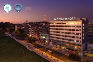 Ein Zertifikat, Auszeichnung, Logo oder anderes Dokument, das in der Unterkunft Mercure Lisboa Almada ausgestellt ist