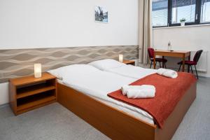Postel nebo postele na pokoji v ubytování Hotel VP1