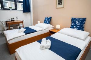 Postel nebo postele na pokoji v ubytování Hotel VP1