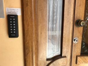 a door that has a remote control on it at Casa Montegri 2 in Hal Ghaxiak