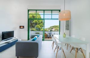 TV a/nebo společenská místnost v ubytování Vela Blanca SA RIERA duplex w private parking