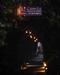 a tunnel with a bunch of lights in the dark at Camilla Resort in Gili Islands
