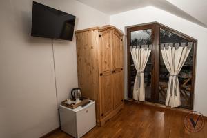 Μια τηλεόραση ή/και κέντρο ψυχαγωγίας στο Veronica’s Guesthouse