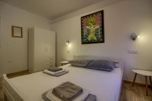 Posteľ alebo postele v izbe v ubytovaní Wonderful villa Nezakcij with pool near the town and the beach