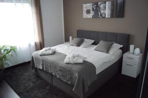 Katil atau katil-katil dalam bilik di La Domus Superior Osnabrück Lotte +25 gambar