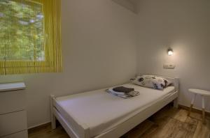 Posteľ alebo postele v izbe v ubytovaní Wonderful villa Nezakcij with pool near the town and the beach