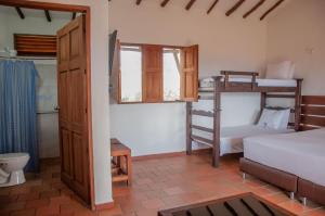 
A bunk bed or bunk beds in a room at Timbarra Cottage
