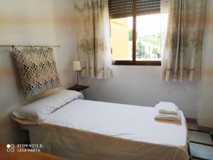 Katil atau katil-katil dalam bilik di Casa MarTa