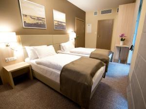 Hotel Molo Resort客房内的一张或多张床位