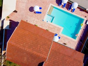 an overhead view of a house with a swimming pool at Villa Plastiras Sidari with private pool in Sidari