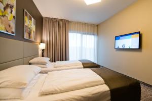 Hotel Molo Resort客房内的一张或多张床位