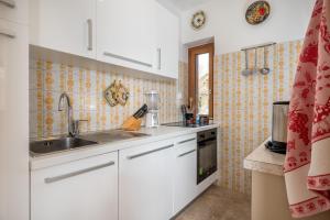 Kuchyň nebo kuchyňský kout v ubytování Residence Weiss