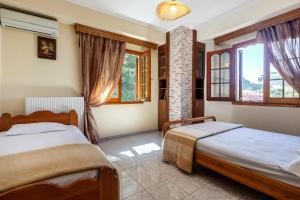 Postel nebo postele na pokoji v ubytování San Giorgio Villa