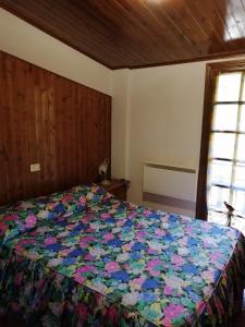 Säng eller sängar i ett rum på Le Conifere Garden Residence