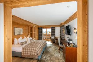 Postel nebo postele na pokoji v ubytování Chalet RoyAlp Hôtel & Spa + 37 fotografií