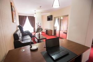 TV a/nebo společenská místnost v ubytování Hotel Meliss