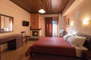 Postel nebo postele na pokoji v ubytování Hotel Oreades
