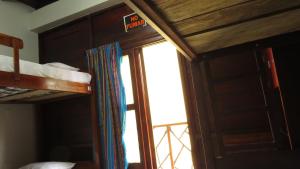 Postel nebo postele na pokoji v ubytování Esperanto Bed & Breakfast Surf Hostel