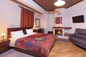 Postel nebo postele na pokoji v ubytování Hotel Oreades