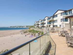 a view of the beach from the balcony of a resort at 17 Burgh Island Causeway in Kingsbridge