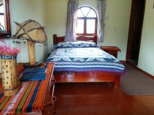 Voodi või voodid majutusasutuse Hostal Curiñan toas