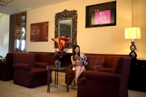 Χώρος καθιστικού στο Hotel Aztlan