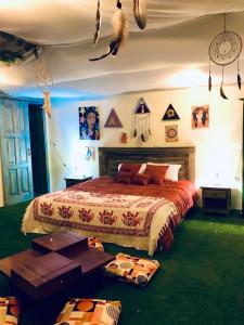 Ein Bett oder Betten in einem Zimmer der Unterkunft Cosmos Chill - Suite con jacuzzi y acuario