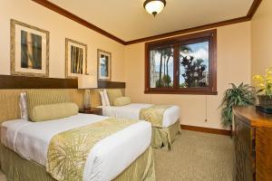 Postel nebo postele na pokoji v ubytování Luxury Pool front Ko Olina Beach Rental Ground Floor B105 2BR free parking + 29 fotografií