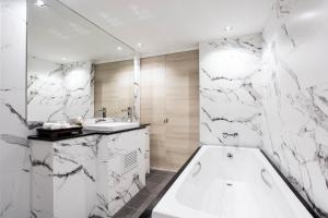 Koupelna v ubytování Methavalai Hotel