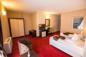 Postel nebo postele na pokoji v ubytování Hotel Meliss