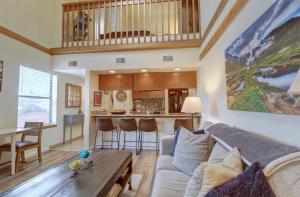 a living room with a couch and a table at 201C Mountain Side 1BR 1BA condo in Frisco