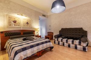 Postel nebo postele na pokoji v ubytování Hotel Columbia Wellness & Spa