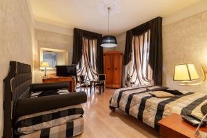 Postel nebo postele na pokoji v ubytování Hotel Columbia Wellness & Spa