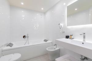 Koupelna v ubytování Hotel Columbia Wellness & Spa