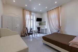 Postel nebo postele na pokoji v ubytování Hotel Columbia Wellness & Spa