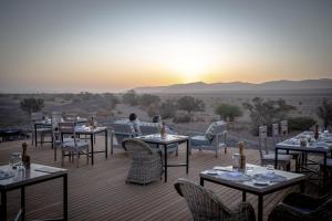 
A restaurant or other place to eat at Wilderness Safaris Kulala Desert Lodge
