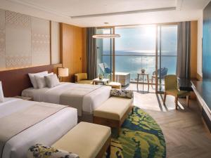 Postel nebo postele na pokoji v ubytování Mövenpick Resort Cam Ranh