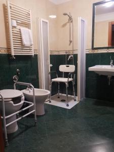 a bathroom with a sink and a tub and a toilet at Hotel Mirage in Rome