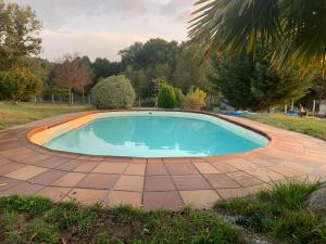The swimming pool at or close to A PORTELA - Pereiro de Aguiar