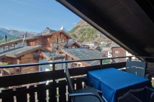 a view from the balcony of a house at Dent Blanche in Zermatt