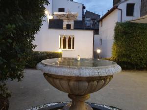 A garden outside Residenza Palazzo Fortuna - Boutique Hotel