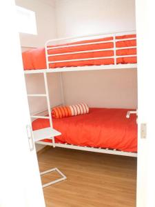 Двох'ярусне ліжко або двоярусні ліжка в номері Apart Hotel Tronador