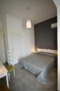 Postel nebo postele na pokoji v ubytování Inkantu B&B