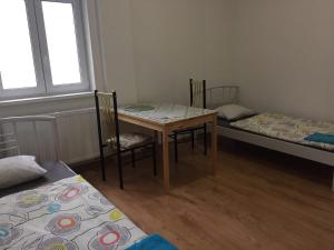 Postel nebo postele na pokoji v ubytování Teplice Central Park