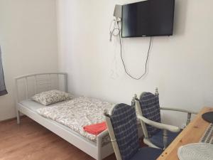 Postel nebo postele na pokoji v ubytování Teplice Central Park