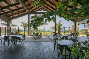 Um restaurante ou outro lugar para comer em Praia do Estaleiro Guest House